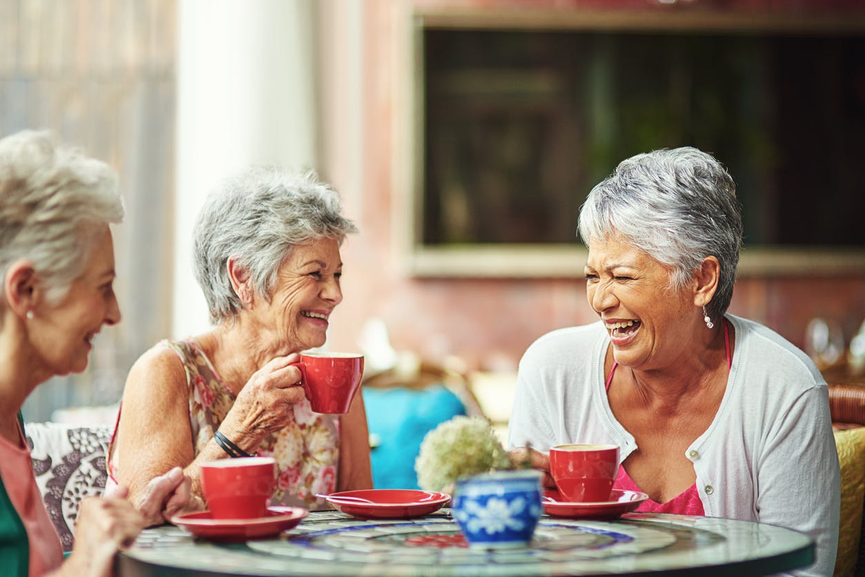 Shot of a three senior women elderly laughing and having coffee together