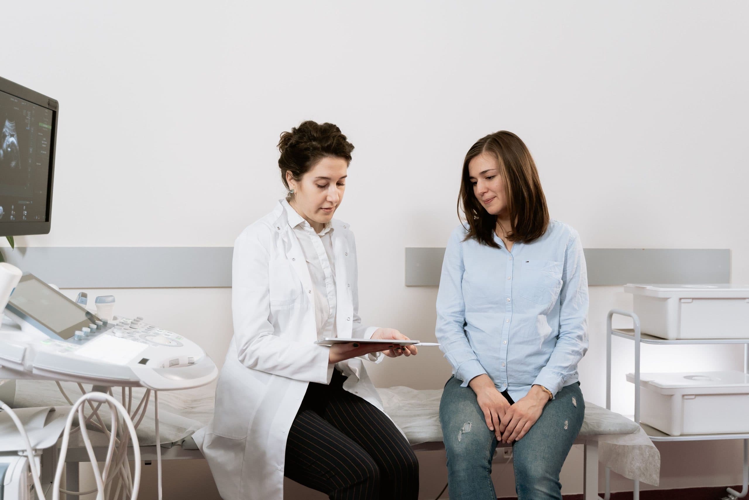 Pregnant woman meeting with a doctor