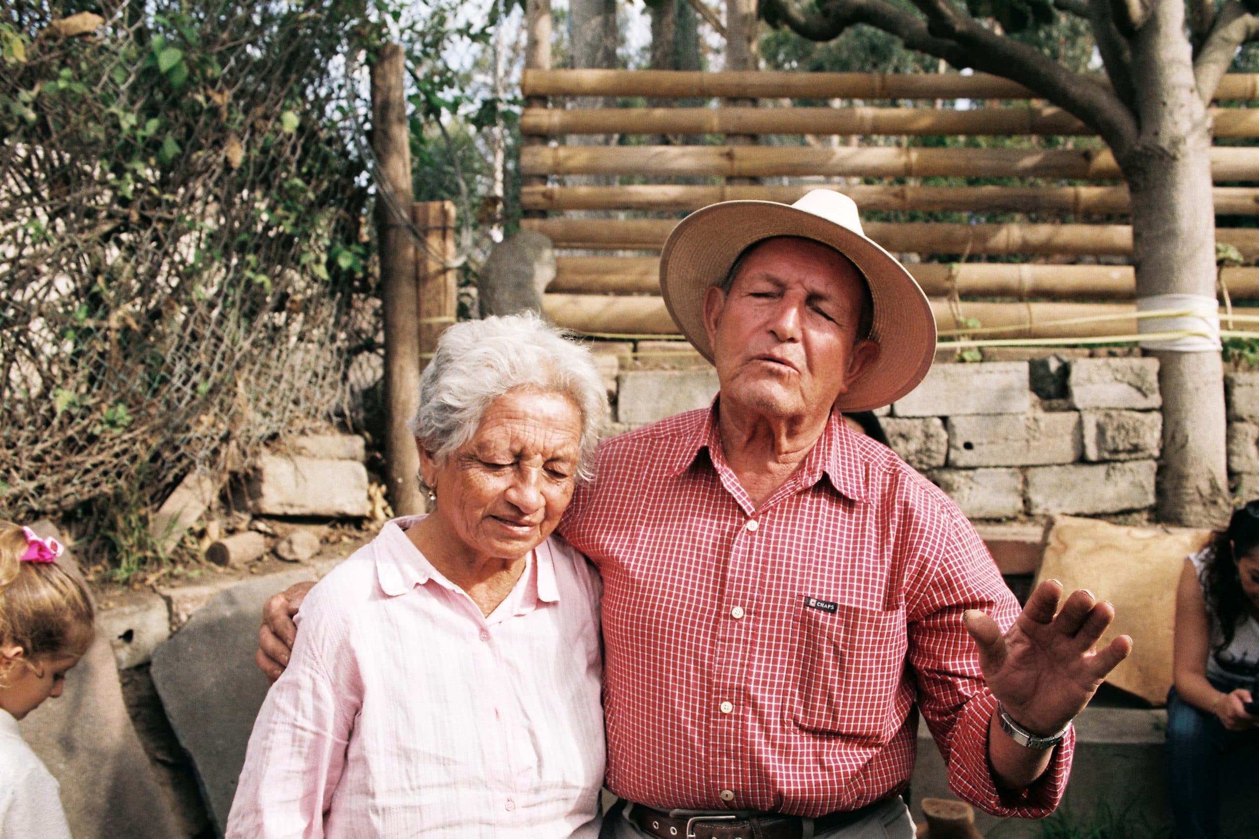Smiling older Latino couple outdoors