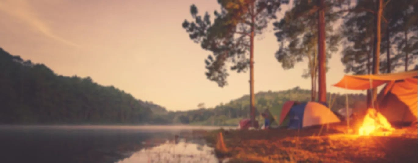 Tents beside a lake